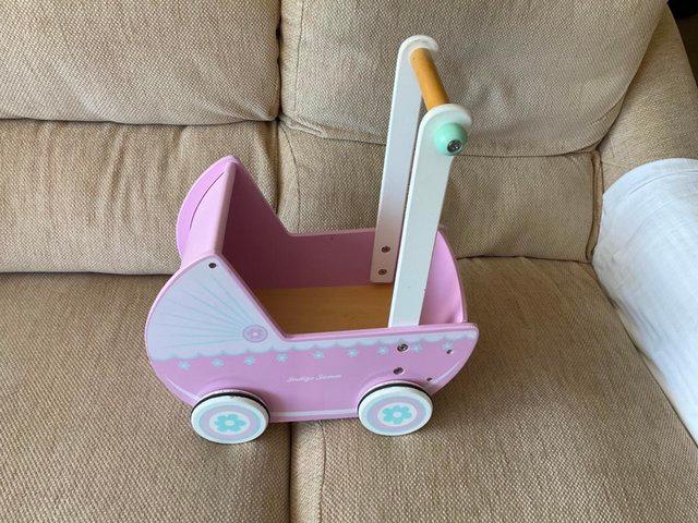 Preview of the first image of Wooden childrens kids Dolls Pram.