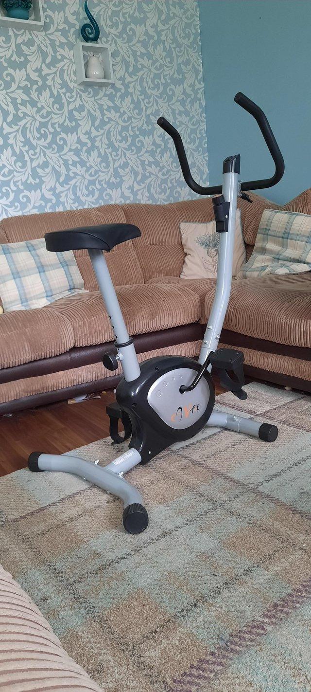 Preview of the first image of V-fit black and grey excerise bike.