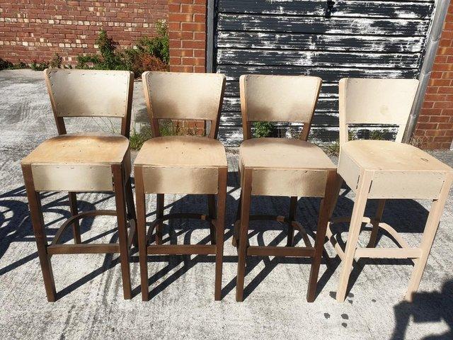 Preview of the first image of 4 NEW WOODEN BAR CHAIRS / STOOLS. BLACKPOOL..