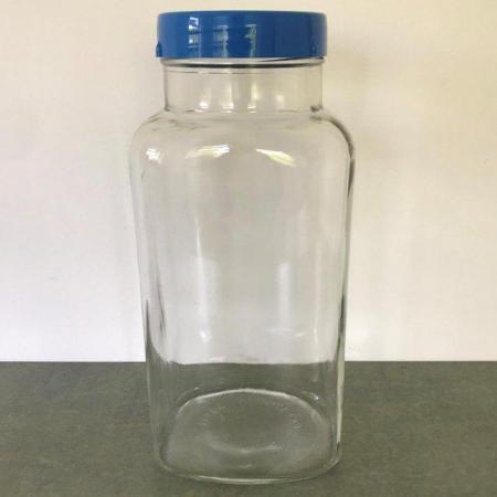 Image 1 of Vintage 1980's Cadbury's Roses sweets glass jar + blue lid.