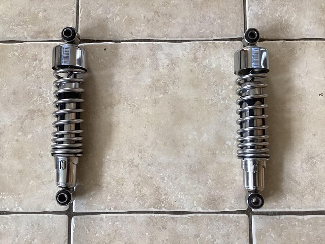 Preview of the first image of Harley-Davidson Sportster 48 OEM rear shocks..