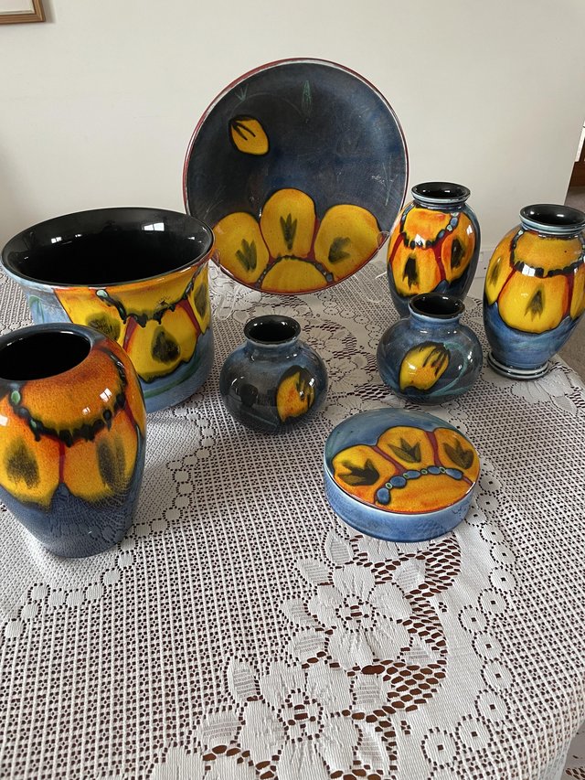 Preview of the first image of Wild Poppy Poole pottery.