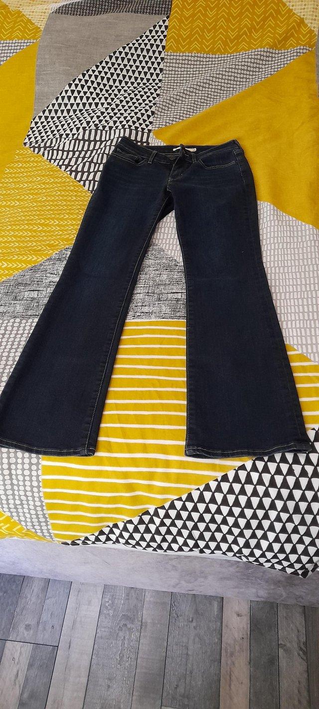 Preview of the first image of Ladies Levi Bootcut Jeans 715 size w26 l30.