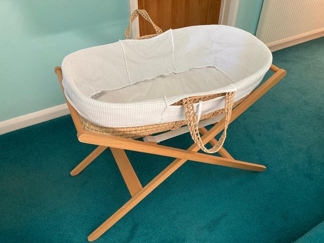 Preview of the first image of John Lewis Moses Basket/Bassinet and Wooden Stand.