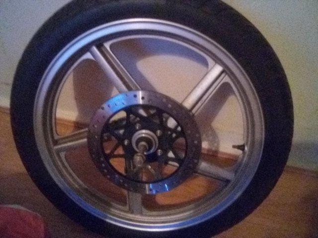 Preview of the first image of Wheel 125cc + tyre + disc, nearly new condition.