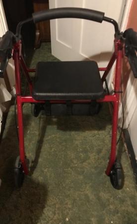 Image 1 of Rollator/walker. With seat by Drive colour red