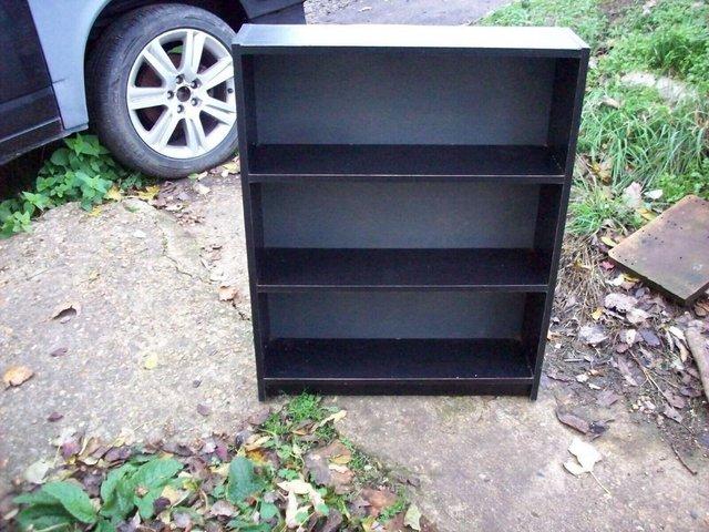 Preview of the first image of Used Black Wooden Bookshelf 16.5 x 65 x 80 cm..