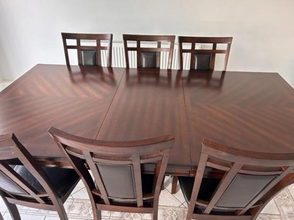 Image 2 of Extendable Dining table with 8 chairs