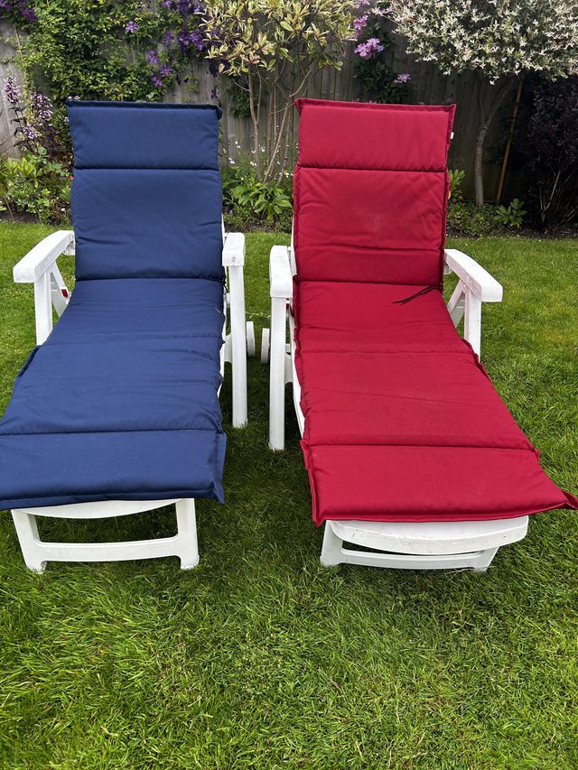 Preview of the first image of A pair good clean gardern sun loungers with cushions.