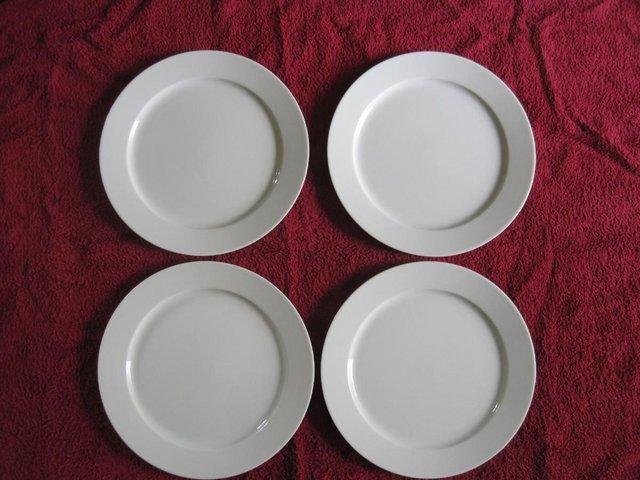 Preview of the first image of Set of four large white plates.