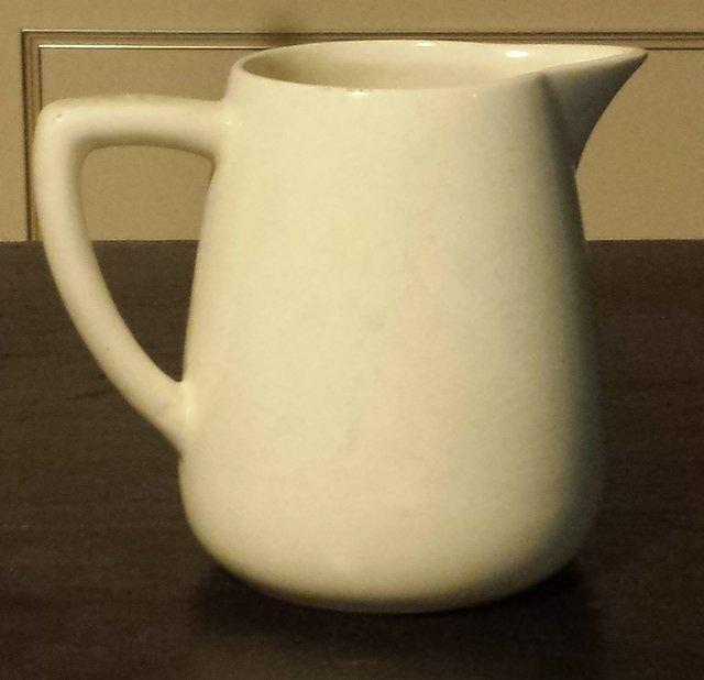 Preview of the first image of Clarice Cliff milk jug.