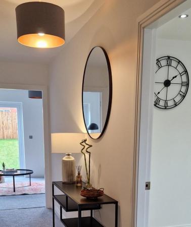 Image 2 of Large round mirror with black metal frame
