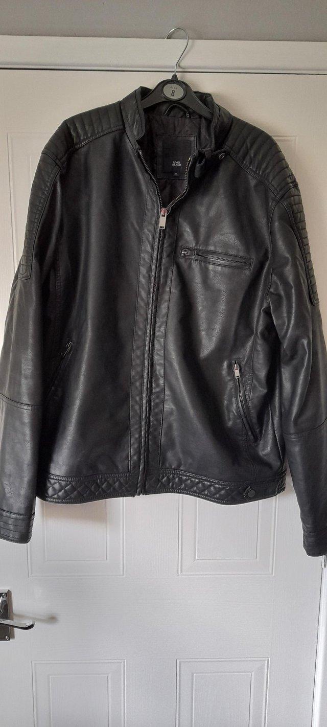 Preview of the first image of Mens Black Faux Leather Jacket size XL.