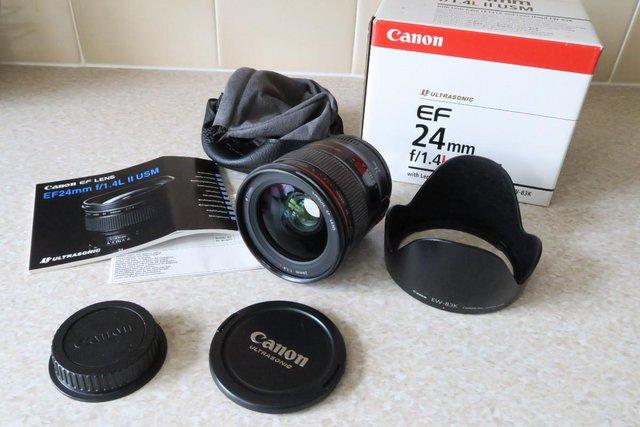 Preview of the first image of Canon EF 24mm f/1.4 II USM Lens L Caps, Case, Box, Ins.