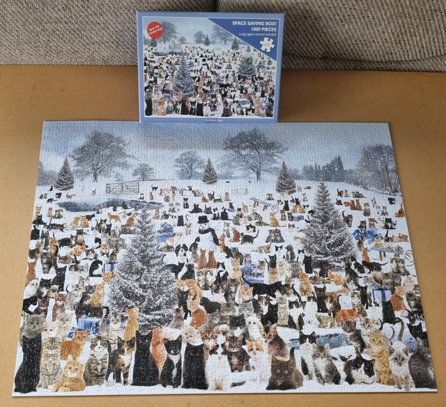 Preview of the first image of 1000 piece jigsaw called CHRISTMAS CATS by OTTER HOUSE PUZZL.