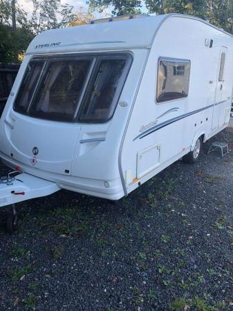 Image 1 of Stirling caravan with air awning