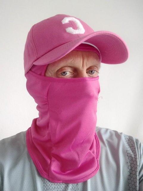 Pink face mask with pink baseball cap. - £18 each