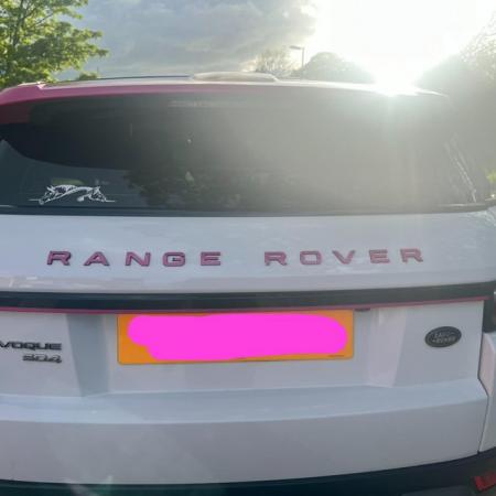 Image 2 of Pink & white Range Rover evoque.