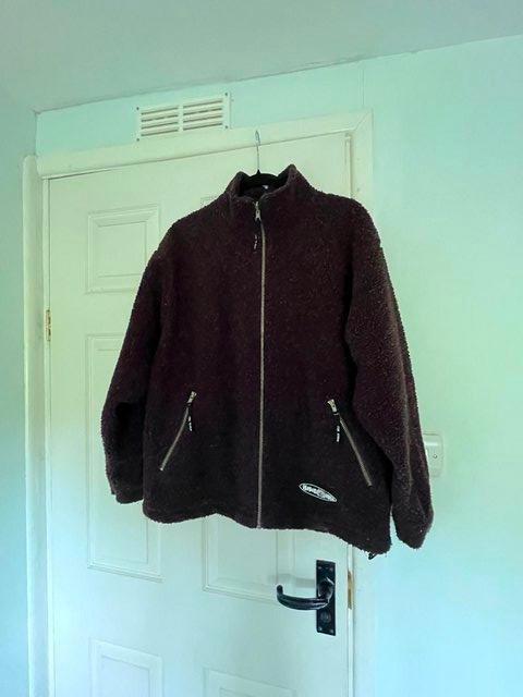 Preview of the first image of Hodge Heg Brown full zip fleece jacket.