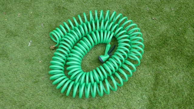 Image 1 of Expanding garden hose with spray head