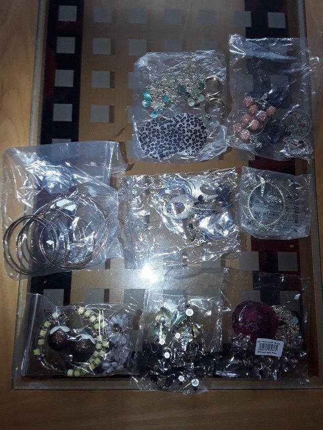 Preview of the first image of Selection of earings and bracelets (costume jewellery).