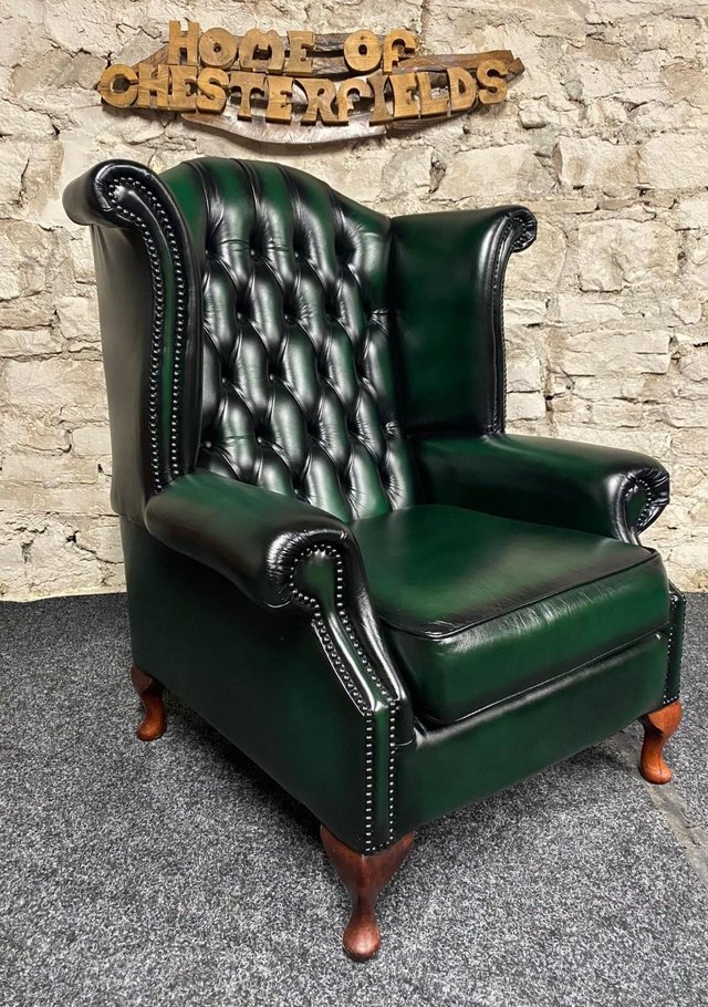 Preview of the first image of Queen Anne Wingbacked Armchair Green Leather.