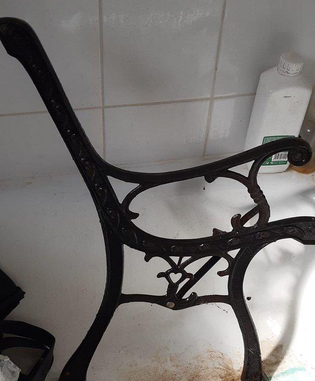 Preview of the first image of Cast iron garden bench ends - small repair needed.