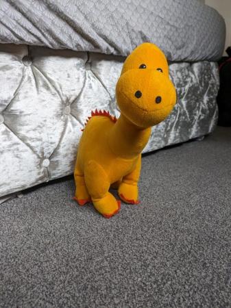 Image 2 of Orange knitted diplodocus soft toy
