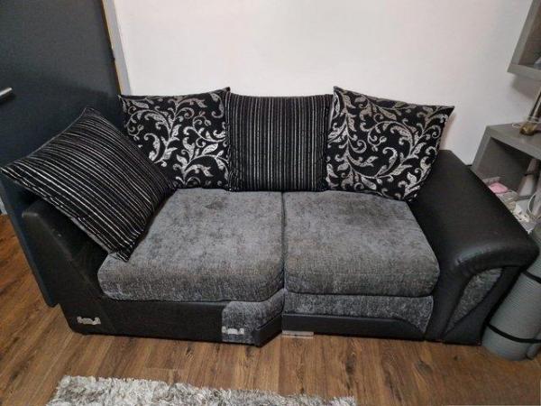 Image 2 of Corner sofa and swivel chair with cushions