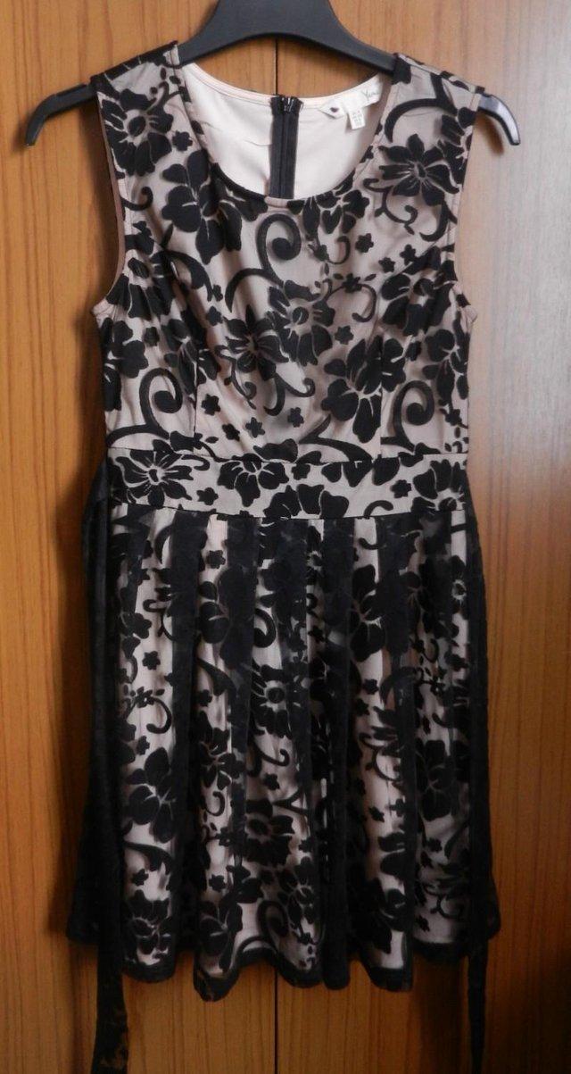 Preview of the first image of Yumi Black Floral Lace Sleeveless Dress Size UK 6.
