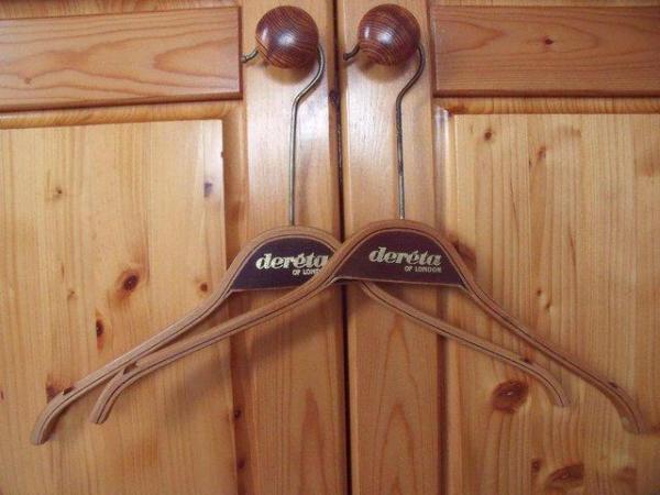 Image 1 of 2 vintage wood coat hangers Dereta of London. £8 both.