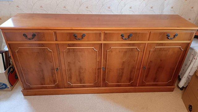 Preview of the first image of Impressive Yew wood sideboard in excellent condition.