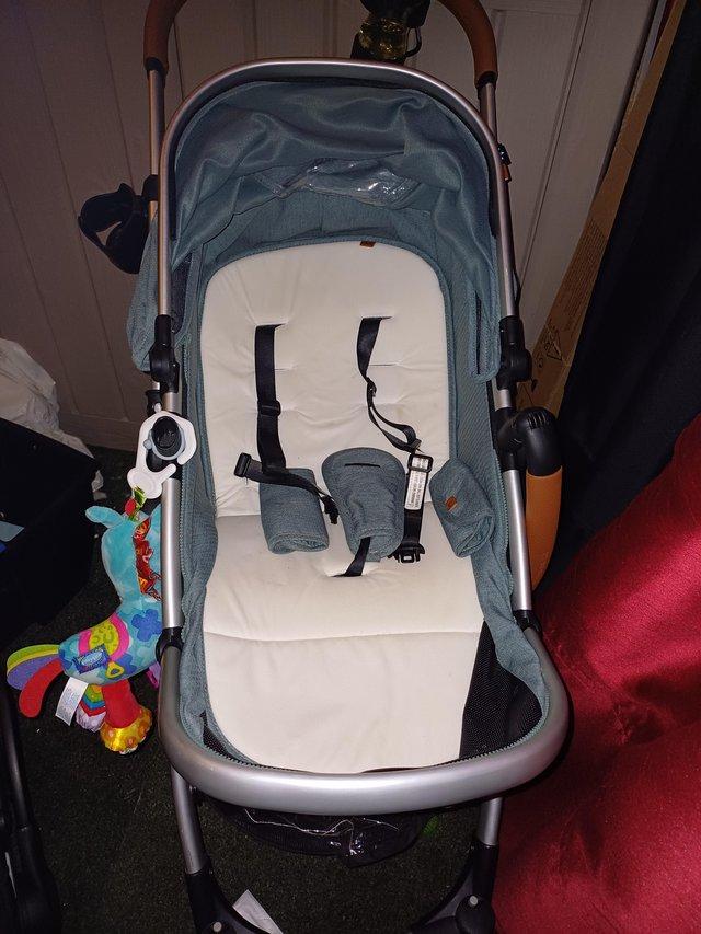 Preview of the first image of Lovely teal travel system.