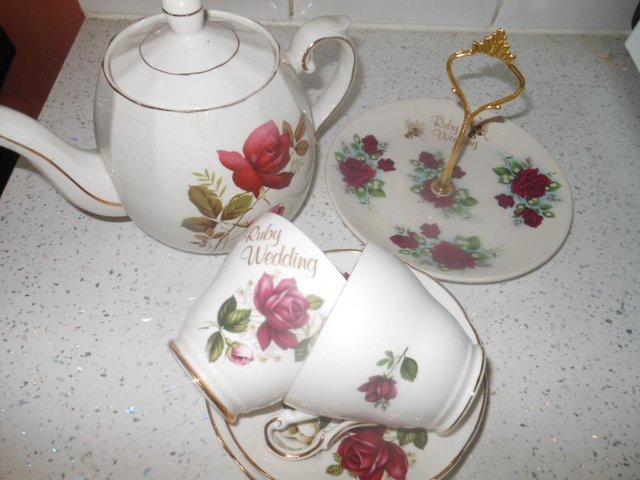 Preview of the first image of Cups Saucers Cake Plate & Tea Pot Red Roses.