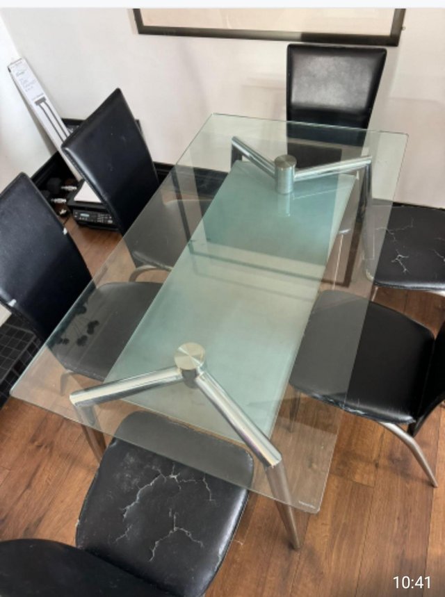 Preview of the first image of Glass table and 6 FREE xchairs.