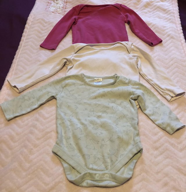 Preview of the first image of Set of three long sleeved baby grows.
