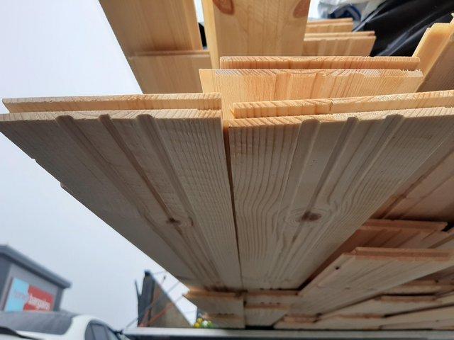 Preview of the first image of Swedish arctic pine redwood. T & G timber cladding.