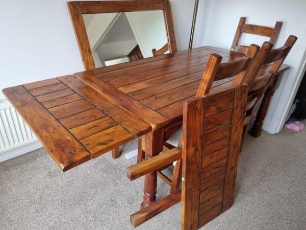 Image 2 of Solid wooden extendable dining table and 6 chairs