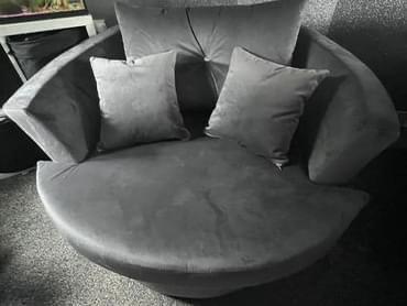 Preview of the first image of LARGE SWIVEL CHAIR ALL IN GREY PLUSH WITH DIAMONTE DETAILED.