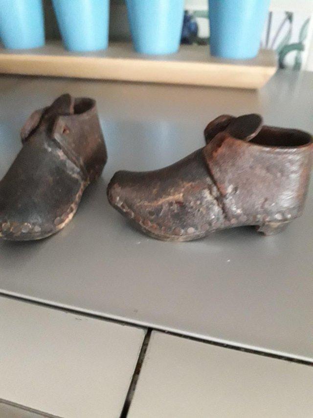 Preview of the first image of pair. of .miniature, antique.clogs.