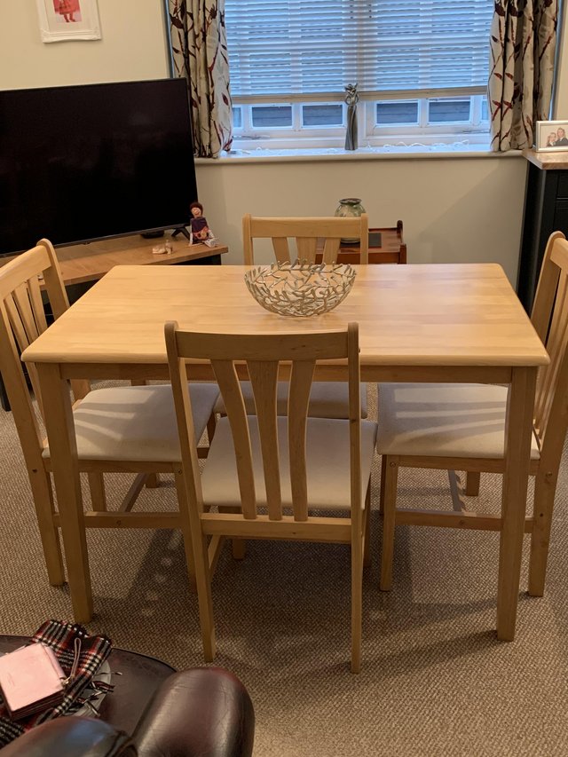 Preview of the first image of Dining table and four chairs.