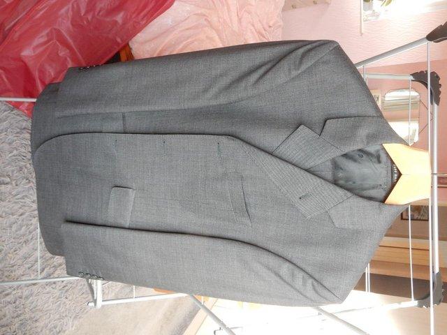Preview of the first image of Men's 2 piece suit in grey centre vent.