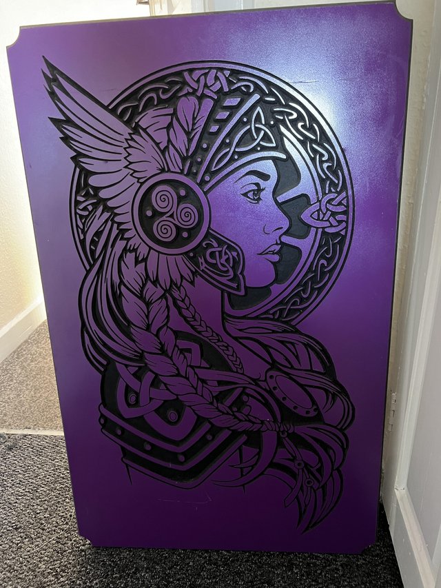 Preview of the first image of Purple Indian woman wall decor.
