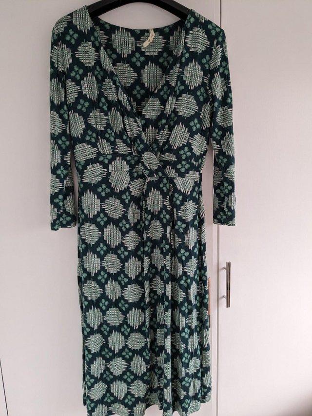 Preview of the first image of White Stuff Green ladies long sleeved dress size 12.