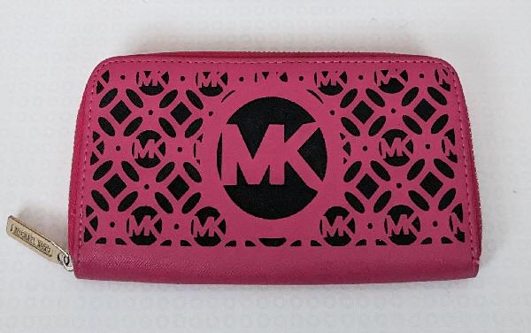 Preview of the first image of Lovely Ladies Pink MK Laser Cut Purse.   BX46.