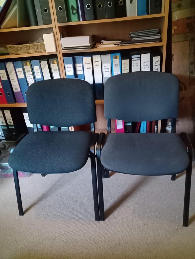 Preview of the first image of A pair of compact office chairs.