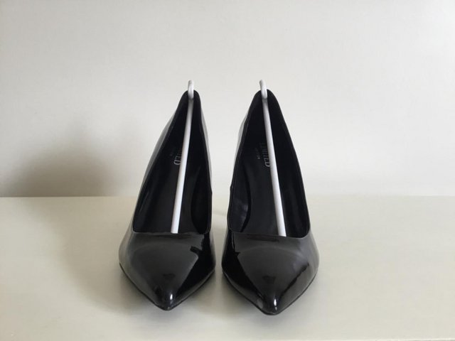 Preview of the first image of Black high heel shoes never worn bought from M and S.