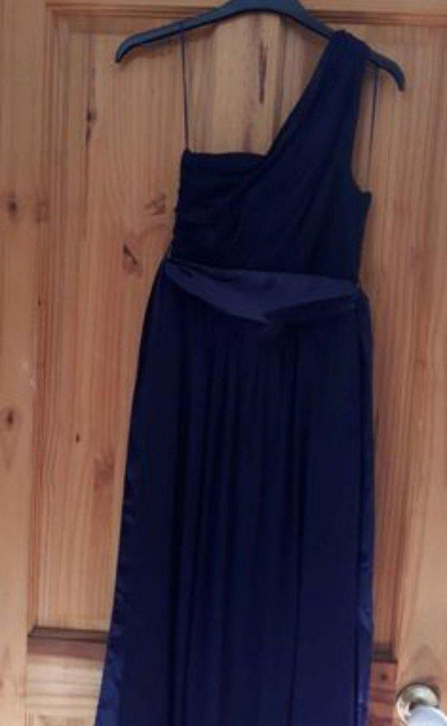 Preview of the first image of Navy one shoulder bridesmaid dress.