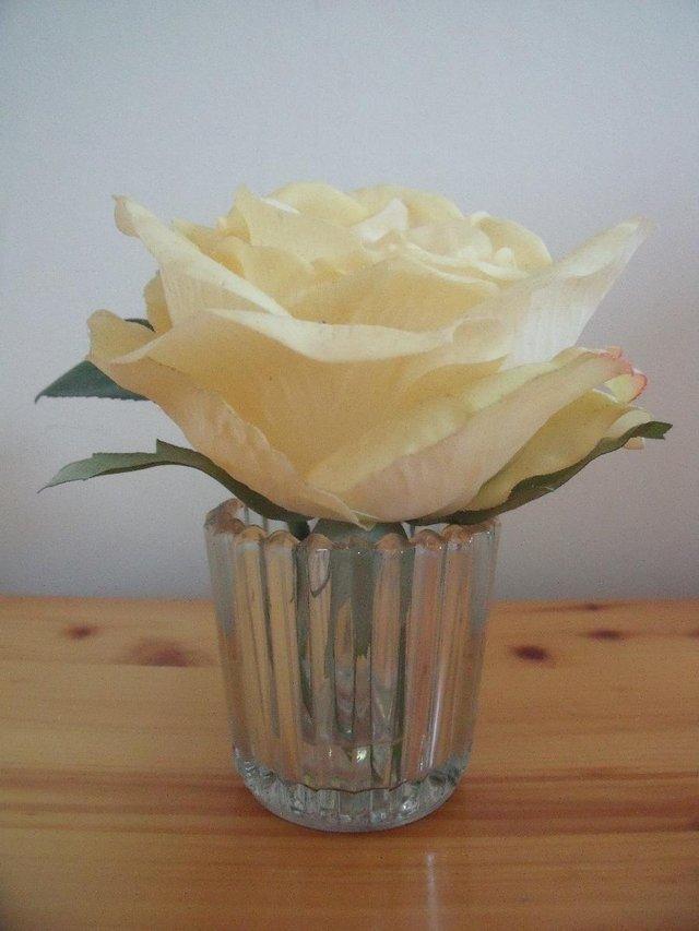 Preview of the first image of Faux, silk, realistic yellow rose & leaves in glass vase..