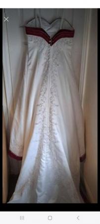 Image 2 of Wedding Dress with Red Detail